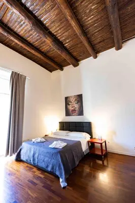 Letto o letti in una camera di Napolidays Movida By Dimorra