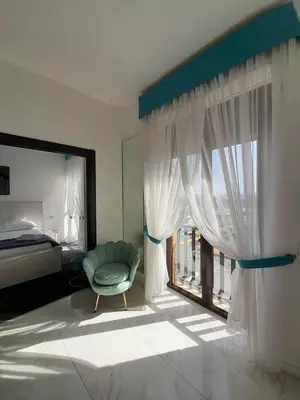 Letto o letti in una camera di Babylon Luxury Suite & Apartments