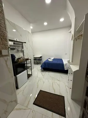 Letto o letti in una camera di Swamy Home