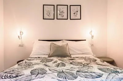 Letto o letti in una camera di EcoSuite Spaccanapoli