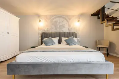 Letto o letti in una camera di Guest House 121 Luxury Apartments