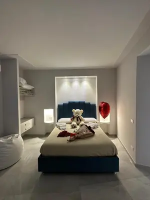 Letto o letti in una camera di Michy Apartment