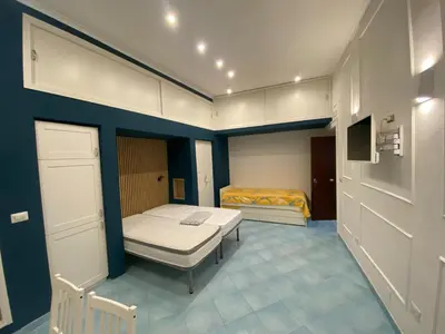 Letto o letti in una camera di The Heart of Naples - Santa Lucia