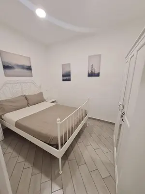 Letto o letti in una camera di Casa Palizzi