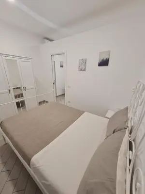 Letto o letti in una camera di Casa Palizzi
