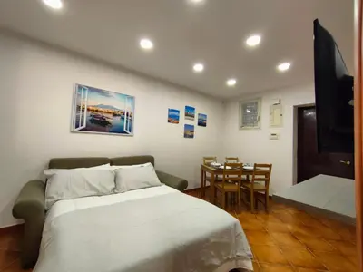 Letto o letti in una camera di Chiaia House Vetriera