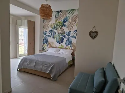 Letto o letti in una camera di Olivella21 Vesuvio