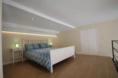 Letto o letti in una camera di Albachiara