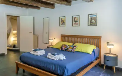 Letto o letti in una camera di GLIKA APPARTAMENTO NAPOLETANO