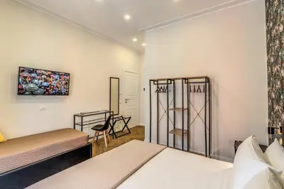 Letto o letti in una camera di Gravina8 - Rooms in Naples