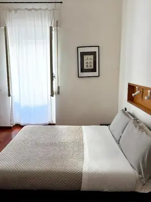 Letto o letti in una camera di Seafront house