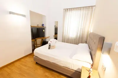 Letto o letti in una camera di Lungomare Suite & Spa