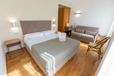 Letto o letti in una camera di Lungomare Suite & Spa