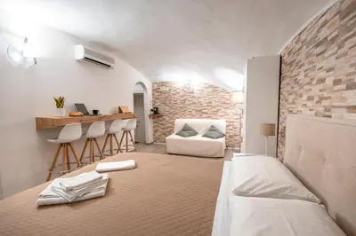 Letto o letti in una camera di Il salotto di Napoli - Guest House