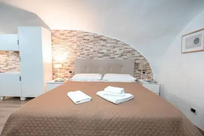 Letto o letti in una camera di Il salotto di Napoli - Guest House