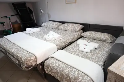 Letto o letti in una camera di Casa Confessore