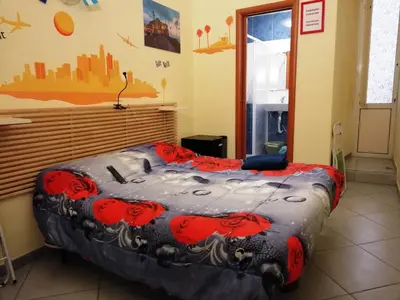 Letto o letti in una camera di B&B Da Roberto