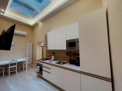 Cucina o angolo cottura di La Suite di Dante Napoli