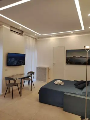 Letto o letti in una camera di Vesuvio View Apartment
