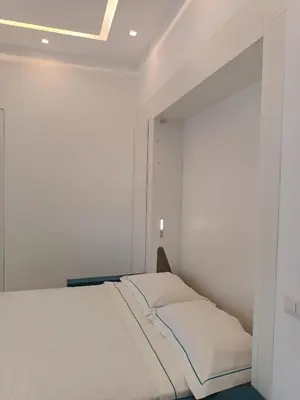 Letto o letti in una camera di Vesuvio View Apartment