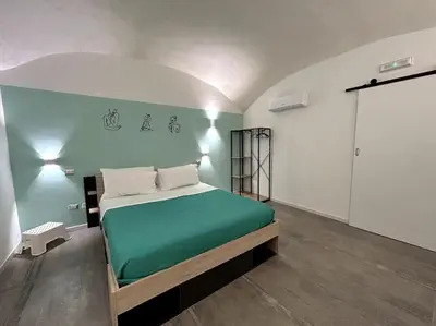 Letto o letti in una camera di Intero Alloggio - Chiaia