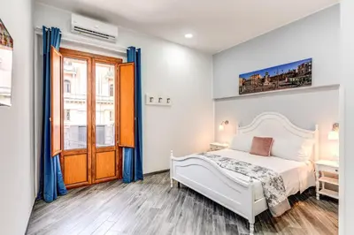 Letto o letti in una camera di Agorà Borsa