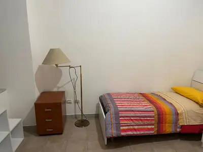 Letto o letti in una camera di Napoletana Duomo