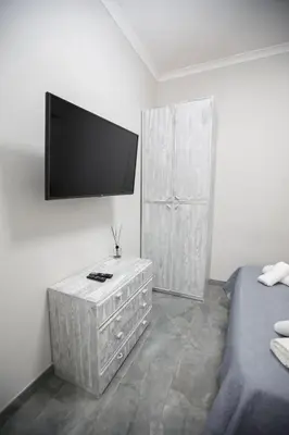 TV o dispositivi per l'intrattenimento presso MG House_2