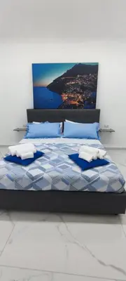 Letto o letti in una camera di La Casetta di Margò