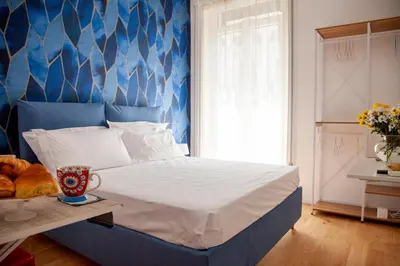 Letto o letti in una camera di Sea Glimpse Studio - Santa Lucia