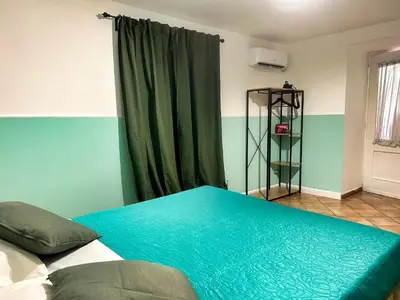 Letto o letti in una camera di Intero Alloggio Salita Tasso