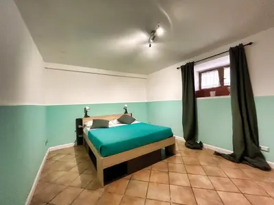 Letto o letti in una camera di Intero Alloggio Salita Tasso