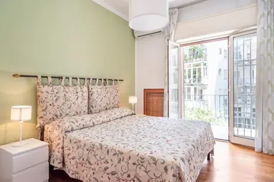 Letto o letti in una camera di Alla scoperta del Vomero