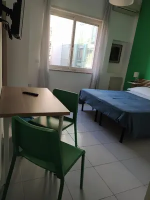 Letto o letti in una camera di NICE STAY