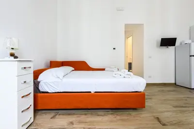 Letto o letti in una camera di Via Morghen 63 - Primo piano