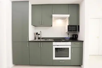 Cucina o angolo cottura di GuestHost - Suite I Miracoli Central Apartment