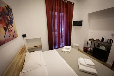 Letto o letti in una camera di Napoli Into Core - Bed & Breakfast