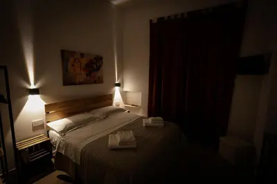 Letto o letti in una camera di Napoli Into Core - Bed & Breakfast