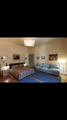 Letto o letti in una camera di Lussuoso appartamento nella Napoli più esclusiva
