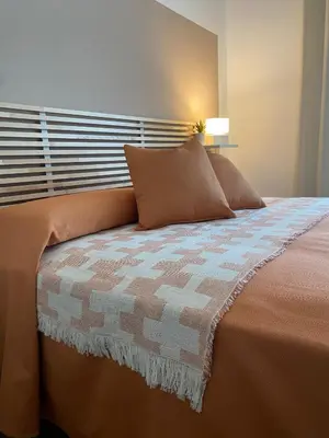 Letto o letti in una camera di Casa Signoria
