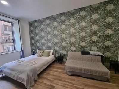 Letto o letti in una camera di Il Fondaco all'Archivio Storico