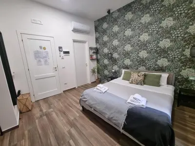 Letto o letti in una camera di Il Fondaco all'Archivio Storico