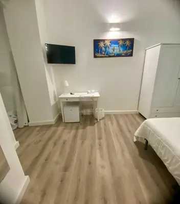 Letto o letti in una camera di Casapartenope 339