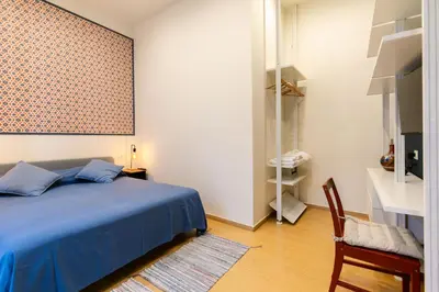 Letto o letti in una camera di Calaba Chiaia