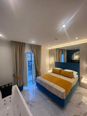 Letto o letti in una camera di La Lepre Artemide