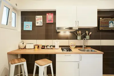 Cucina o angolo cottura di Vicky's Luxury Guesthouse by NapoliApartments