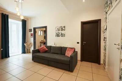 Area soggiorno di Vicky's Luxury Guesthouse by NapoliApartments