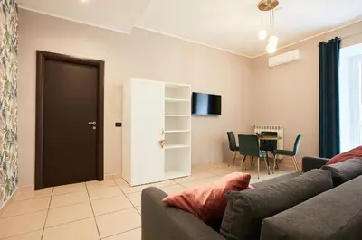 TV o dispositivi per l'intrattenimento presso Vicky's Luxury Guesthouse by NapoliApartments