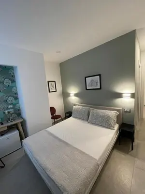 Letto o letti in una camera di Domus Cervantes Apartment
