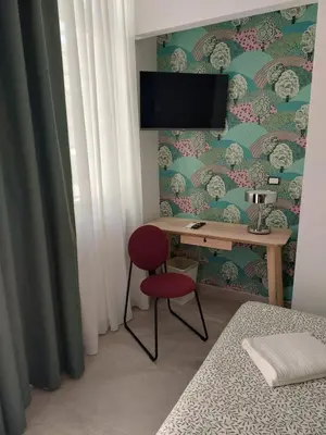 TV o dispositivi per l'intrattenimento presso Domus Cervantes Apartment